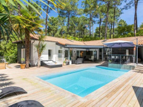 Villa d'architecte avec piscine chauffée et borne de recharge, parfaite pour des vacances en famille - FR-1-791-4